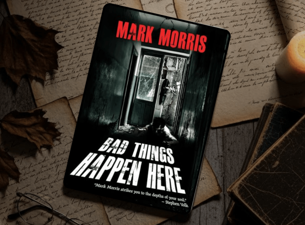 The cover of the book Bad Things Happen Here by Mark Morris. The cover features a dark hallway. At the end of the hallway is door that is broken open.